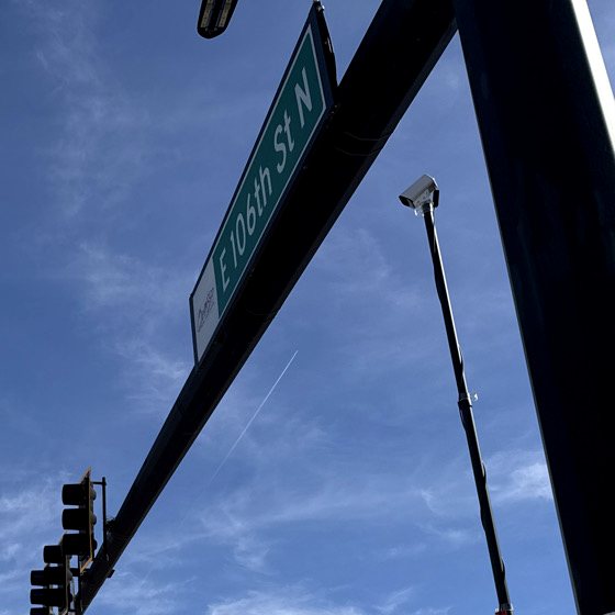 Compact video unit mounted on a signal mast arm above an intersection approach